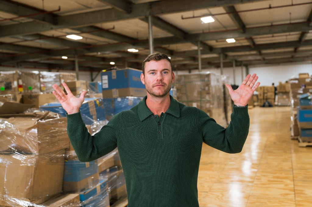 Cameron Hoffman, founder of Ecom Accelerator, in warehouse operations