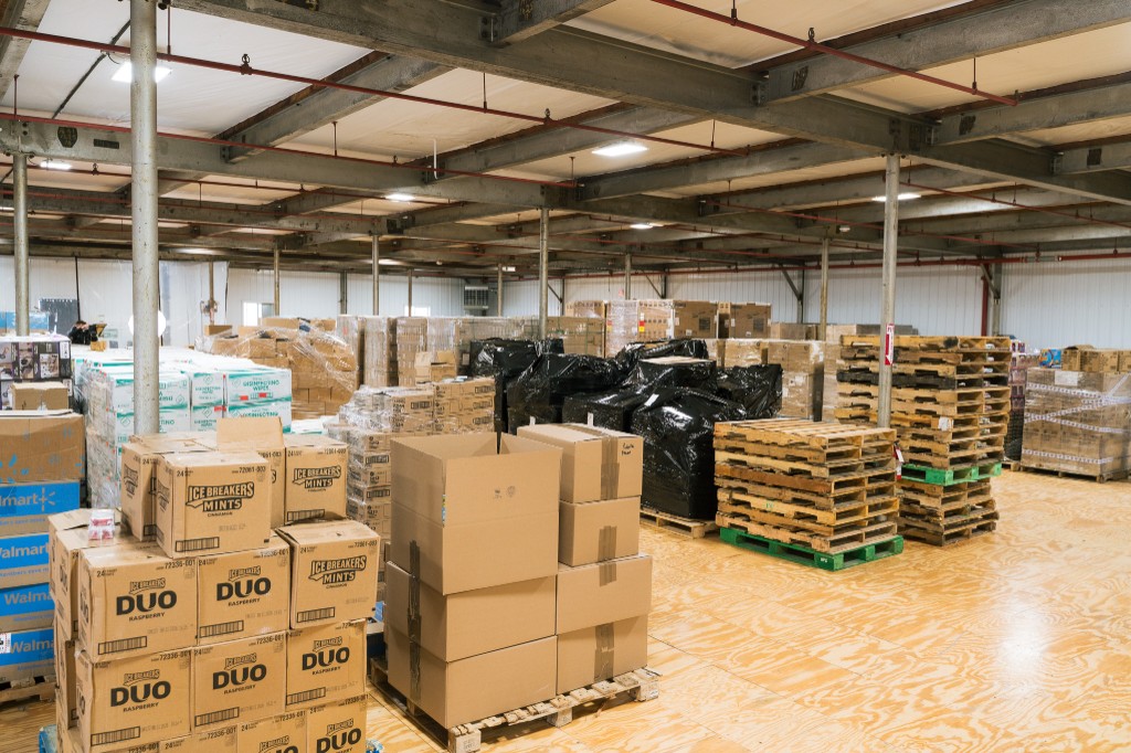 Ecom Accelerator US warehouse main operations floor with palletized inventory